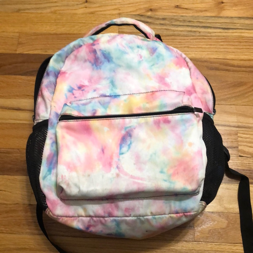 Rainbow Tie-Died Backpack with Water Bottle Pockets on the side.